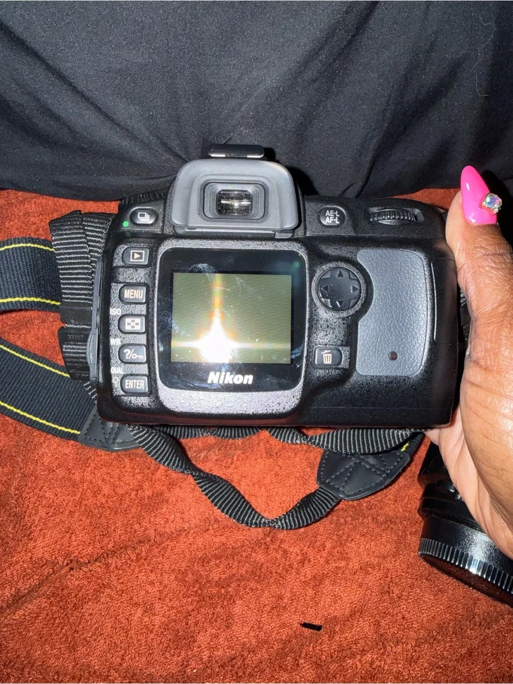 Nikon DSLR Camera Kit with Black Lowepro Bag and Yellow-Accented Strap